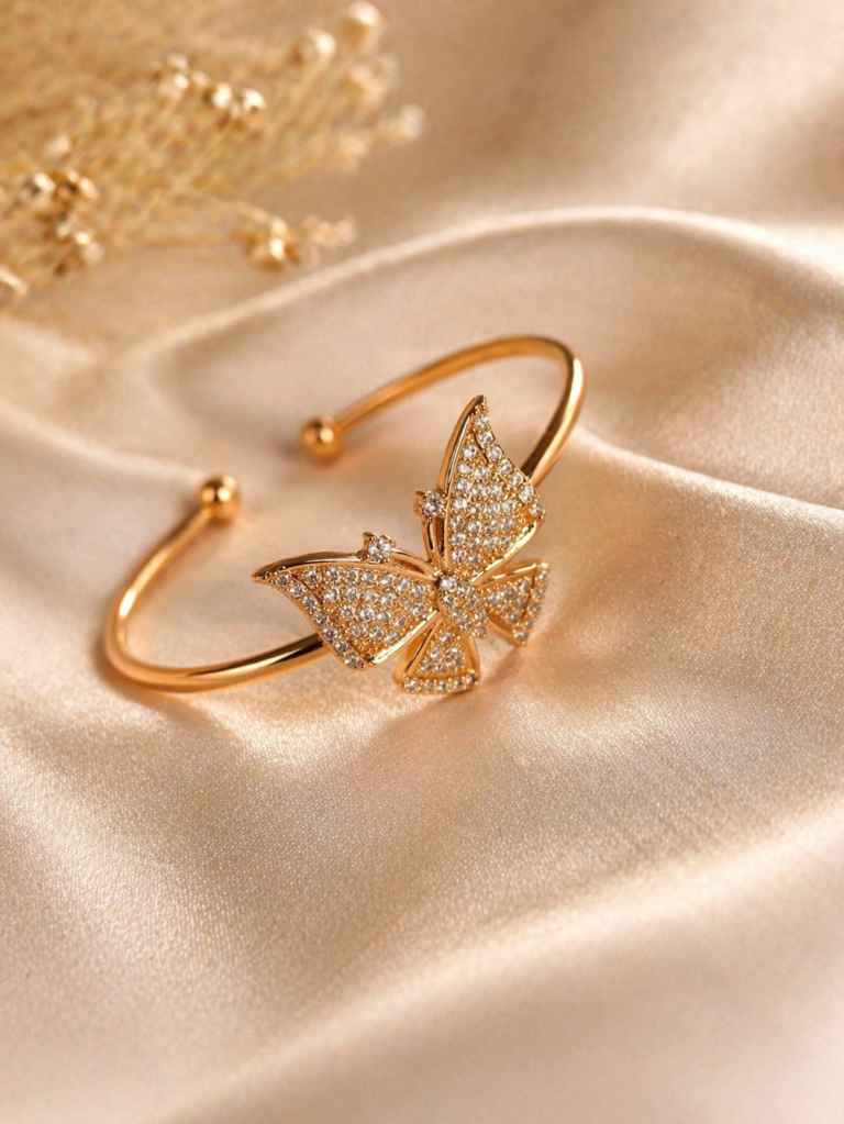 Elegant gold bracelet with butterfly detail