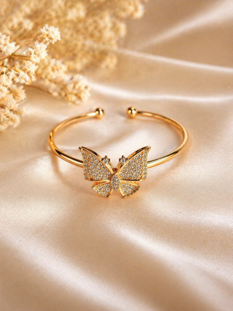 Elegant gold bracelet with butterfly detail